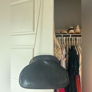 gold and black snakeskin purse